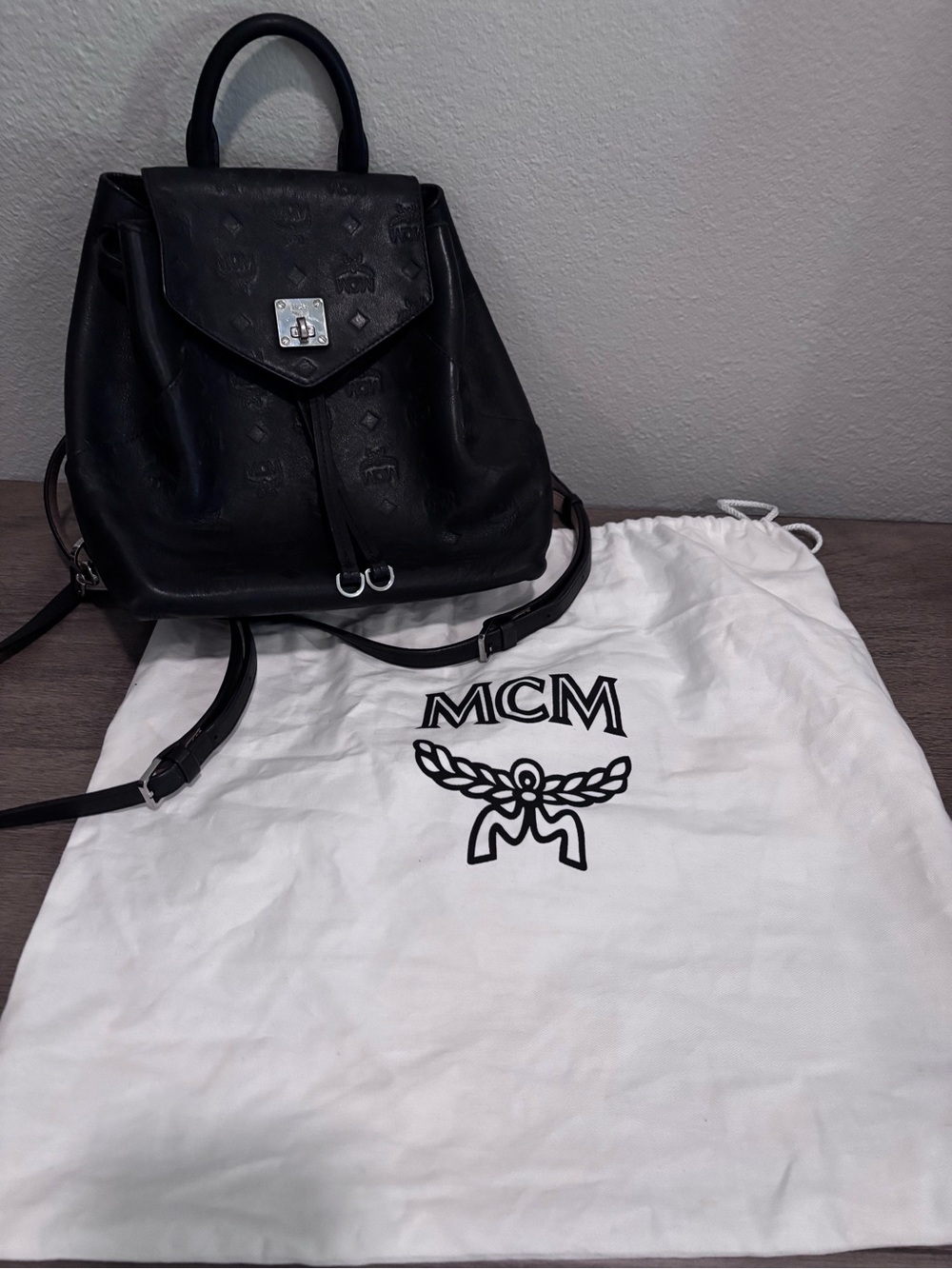 MCM Black Embossed Leather Drawstring Mini Backpack with Top Handle - Picture 2 of 9